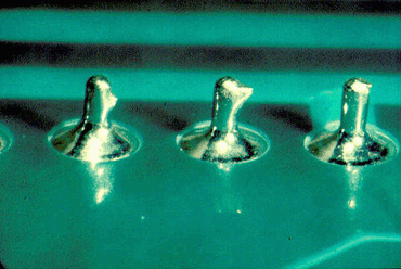 Figure 1: Solder flags or spikes Figure 1: Solder flags or spikes
